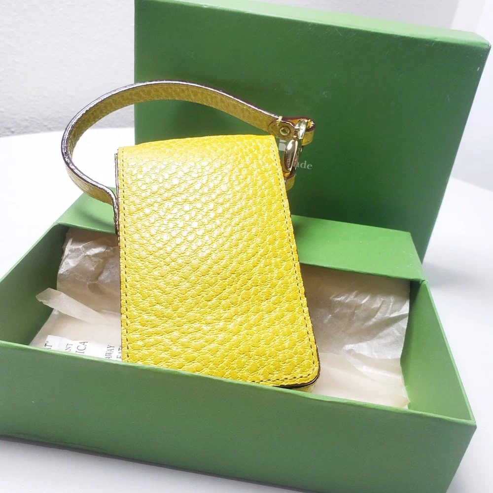 Kate Spade Yellow Pebbled Leather Flip Phone Wristlet Case Gold Hardware NEW NWT